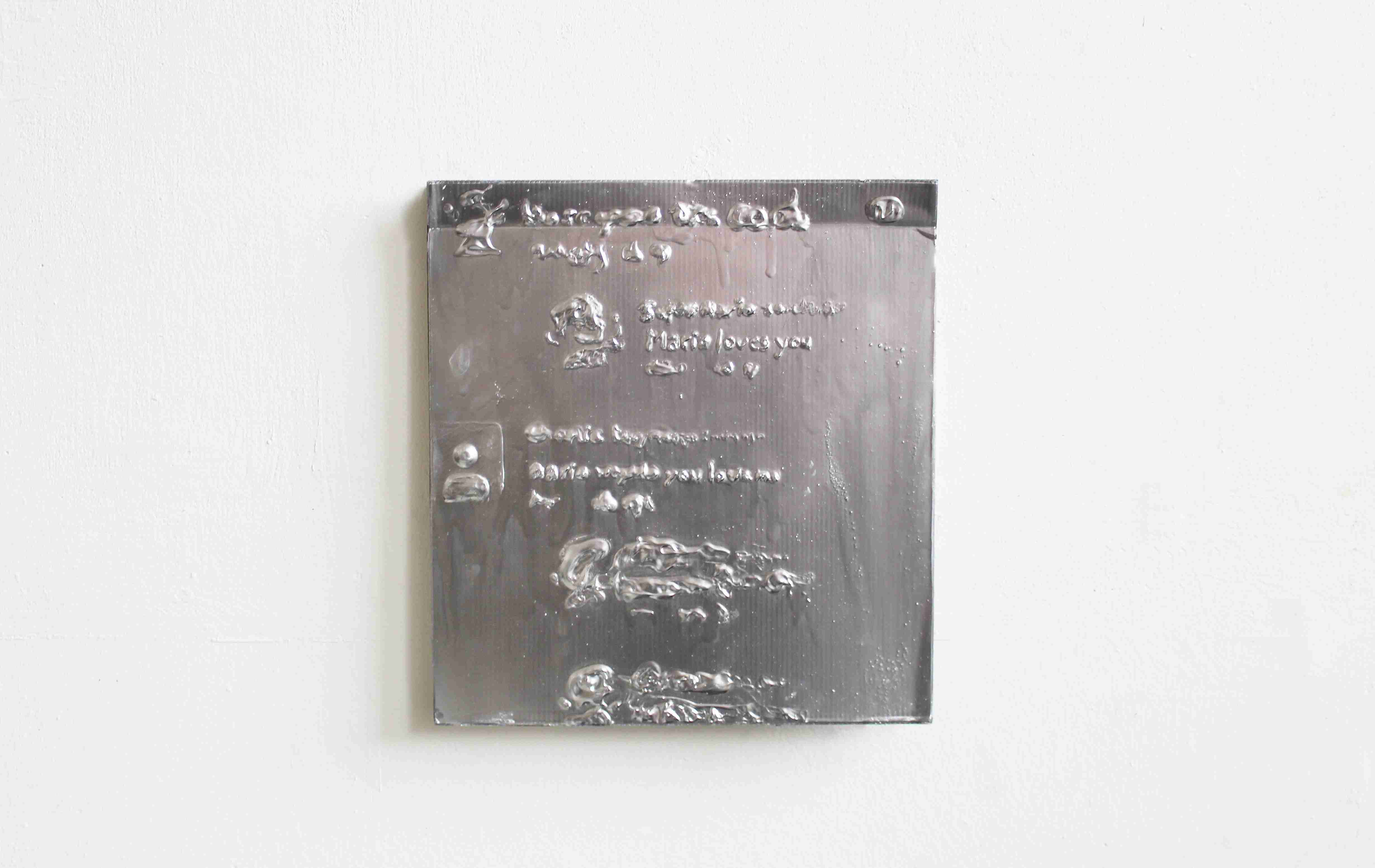 Metal looking painting on white wall