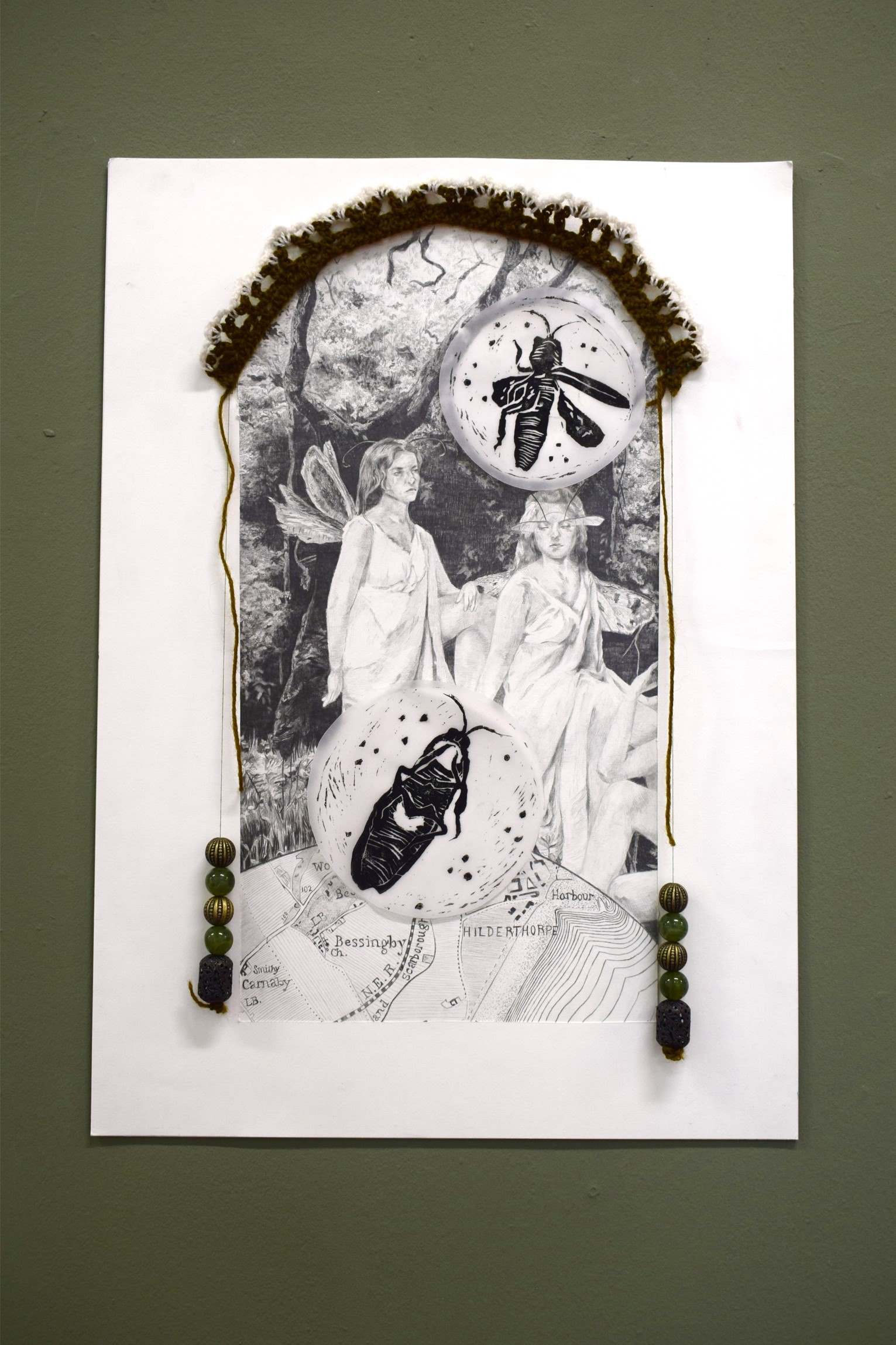 'The lives of the subterranean ’ mixed media work on paper with crocheted bead adornment, 16.5 x 23.4 inches, 2025