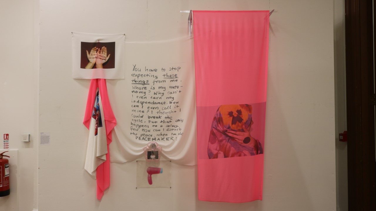 White and pink fabric installed in different ways on the wall