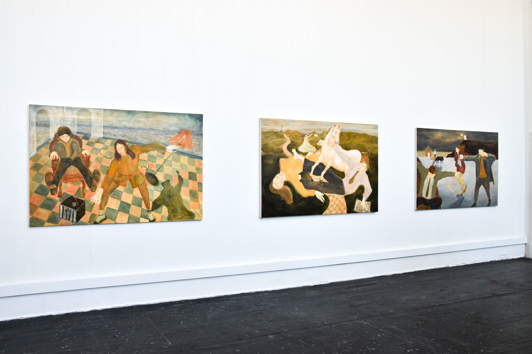 Three paintings side by side  shown as part of graduate show installation 