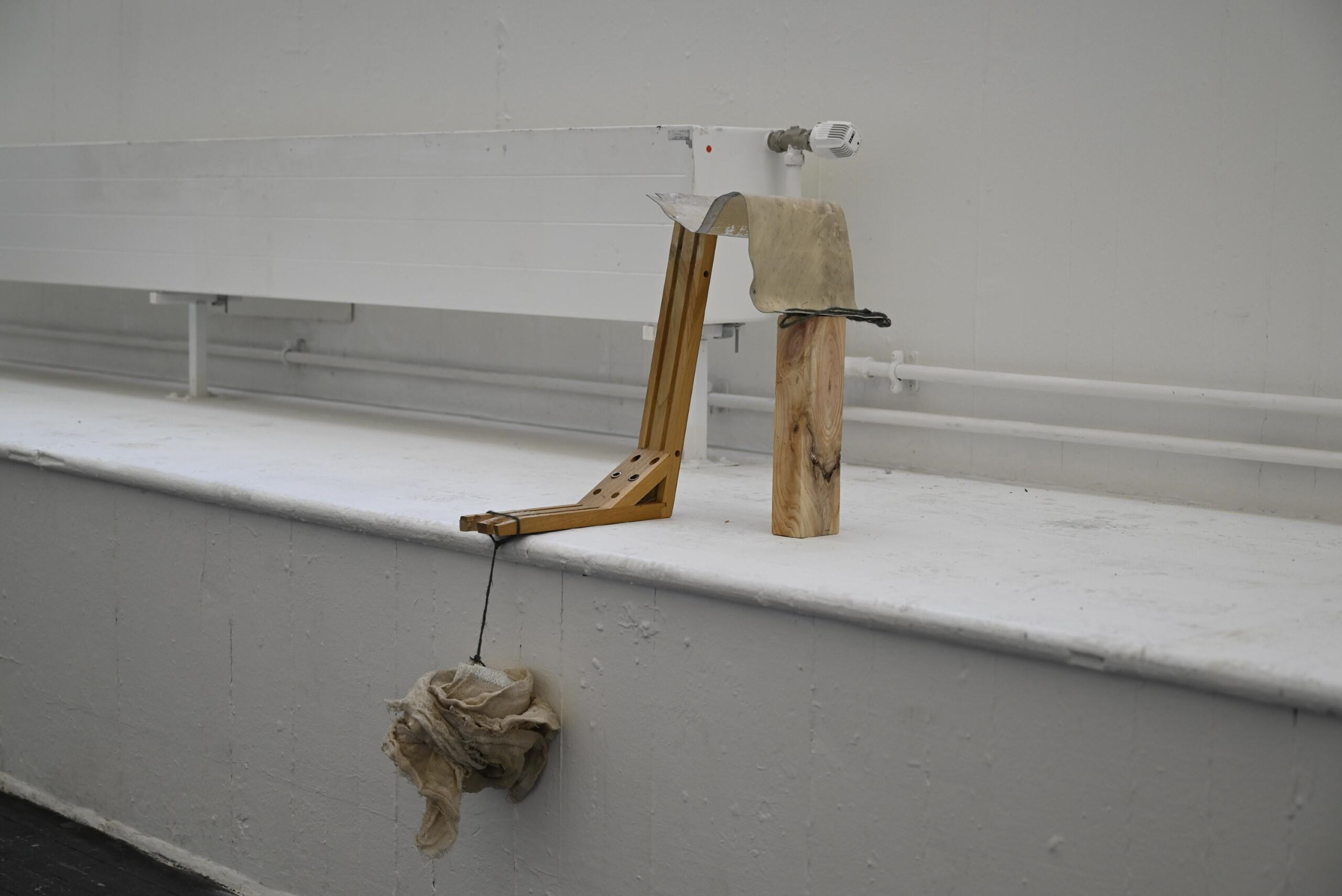 Scrap wood, metal and fabric assemblage 