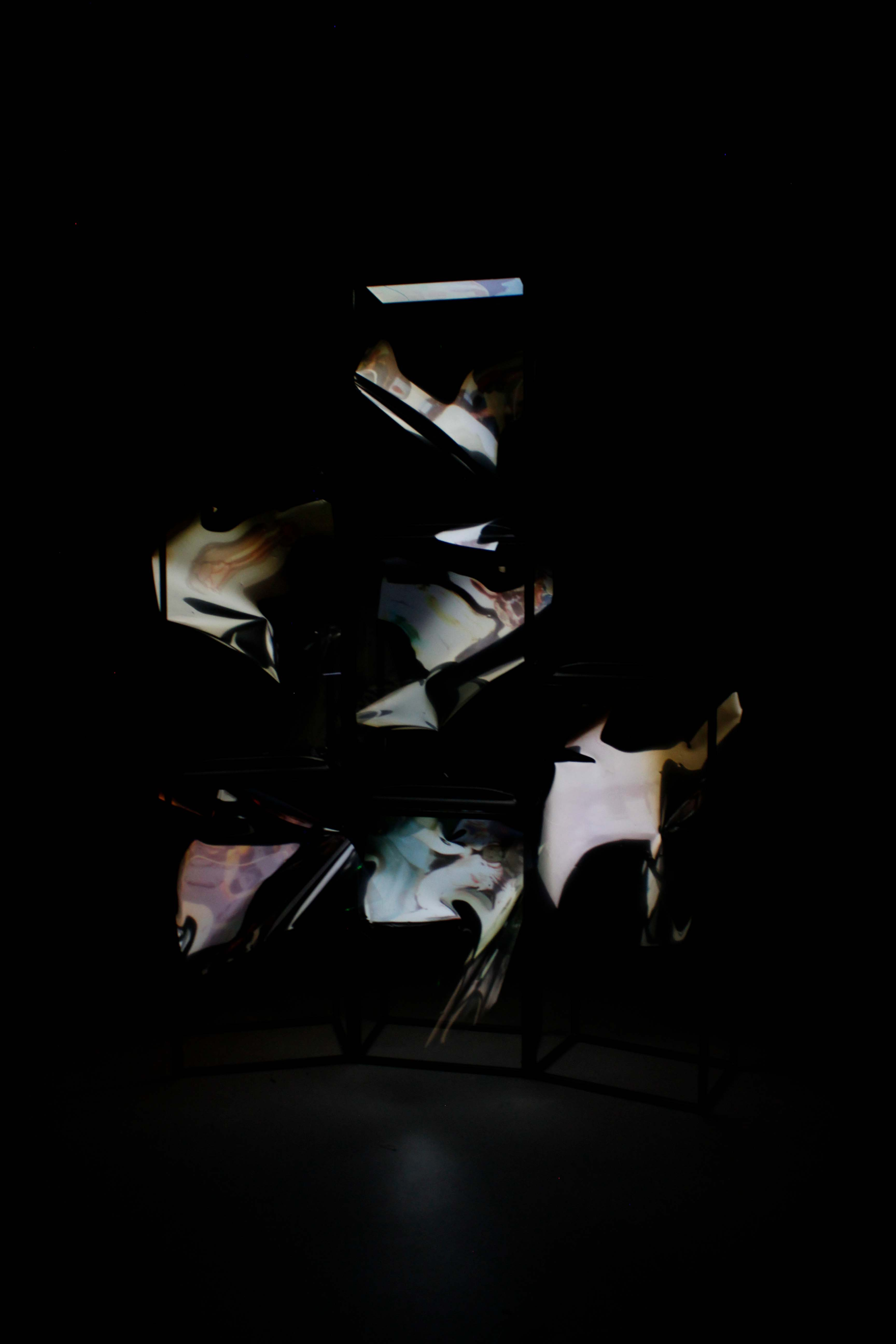 Six distorted images hovering within darkness, capturing moments with friends.