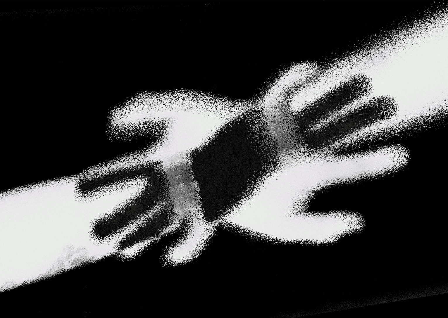 Overlapped hands in black and white.