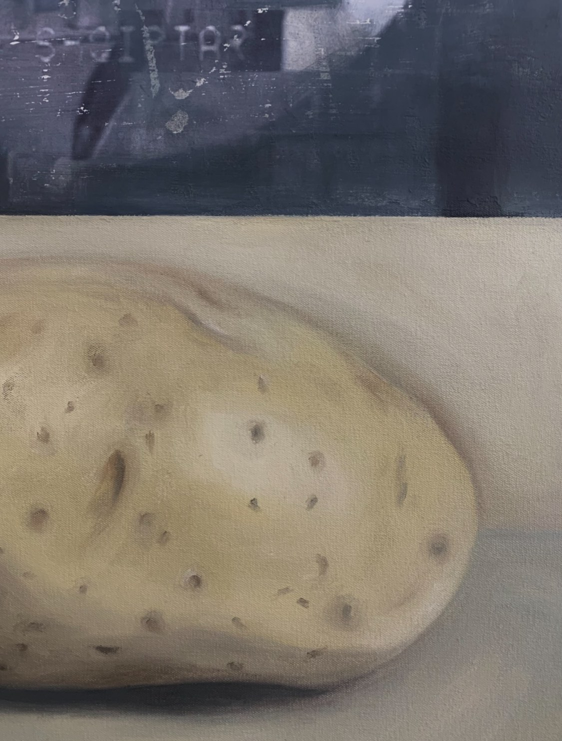 Close-up shot of painting depicting a potato. 