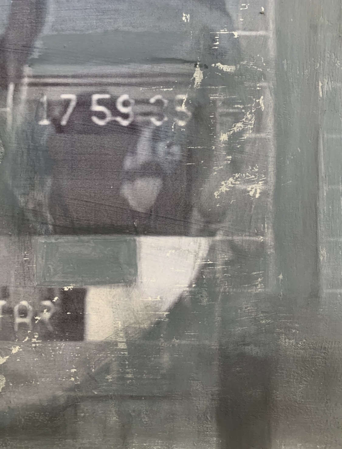 Close-up shot of painting depicting TV card.