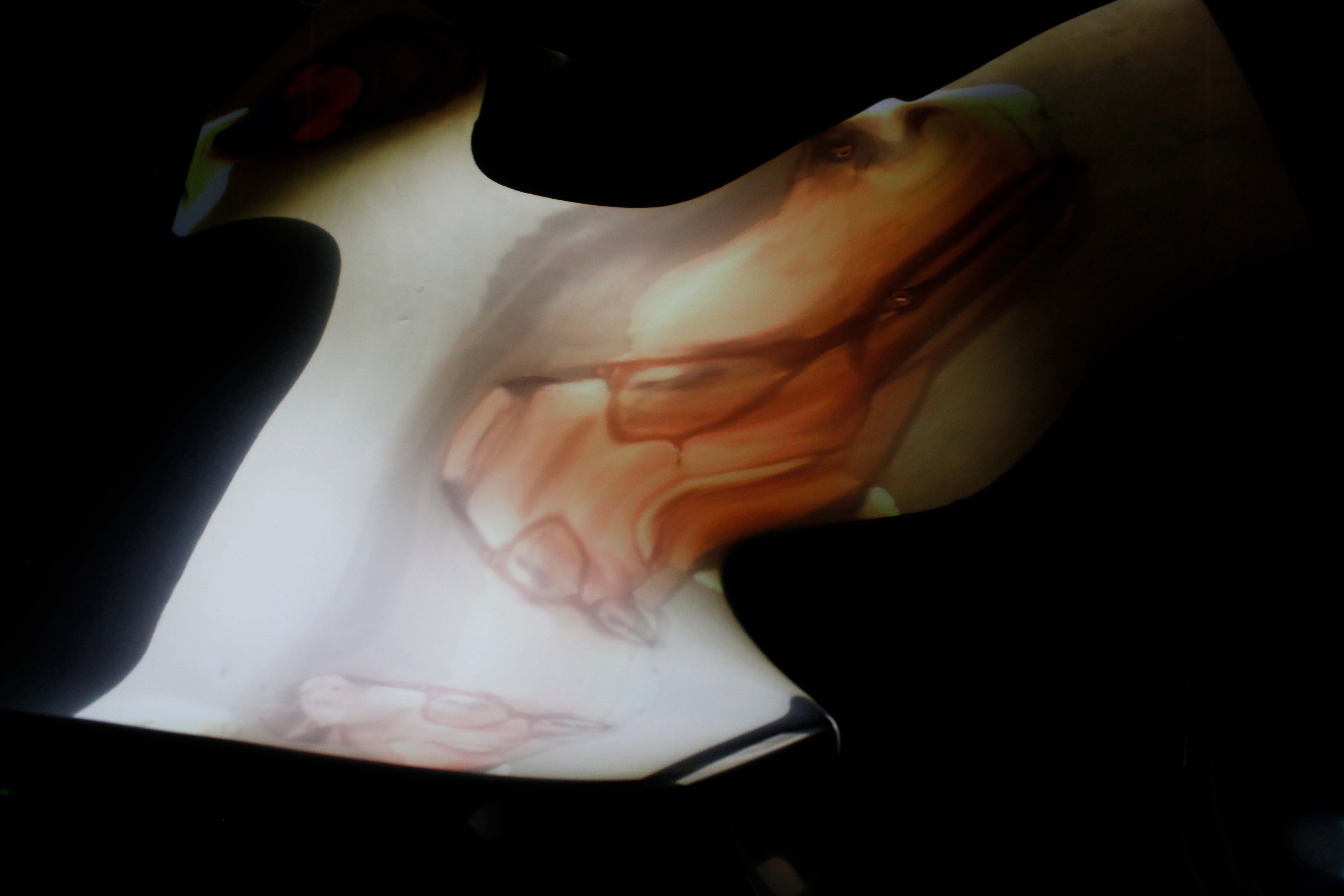 Photograph of woman melting and distorting.