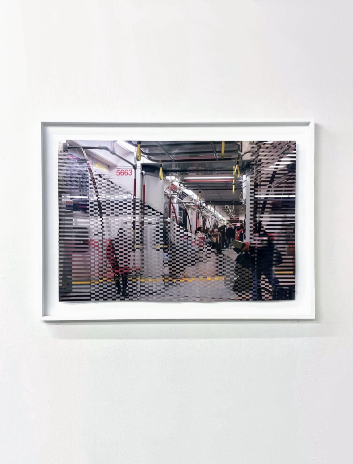 City train, April 2025, 62.5 x 42 cm, woven inkjet prints on satin paper, mounted in wooden frame.