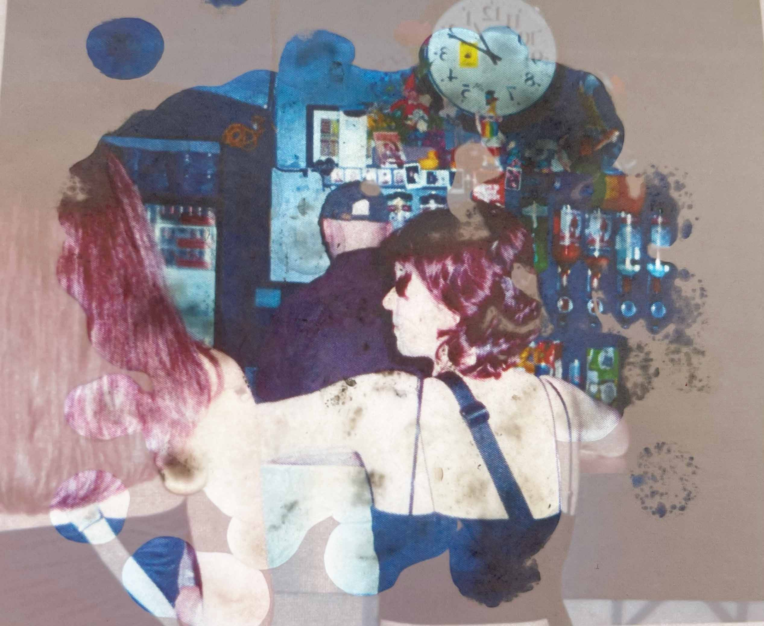 Two people facing a bar.