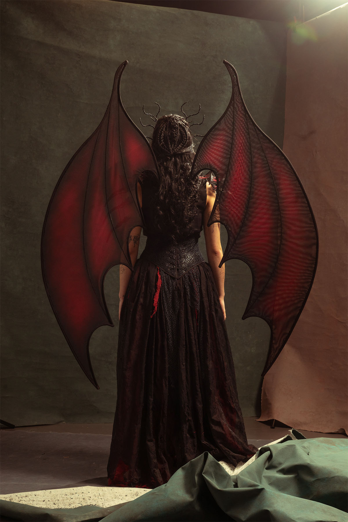 A backview of the costume for Manon Blackbeak, Queen of witches.