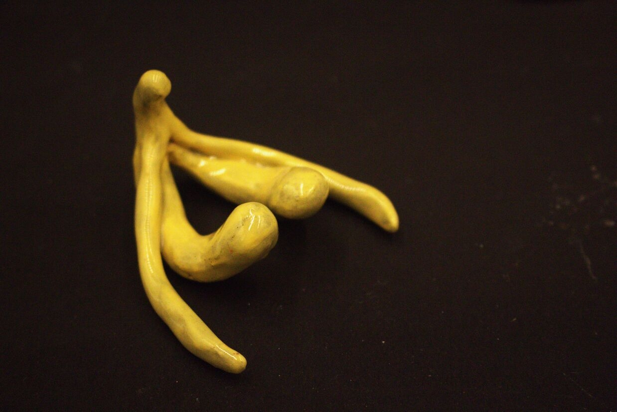 yellow anatomically sized clitoris sculpture