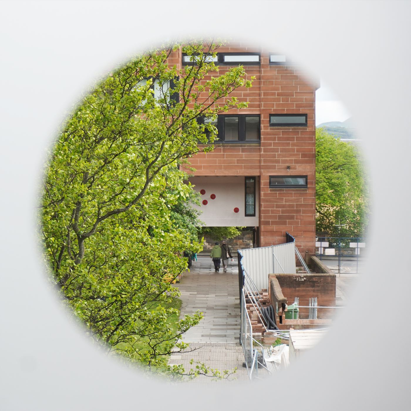 Close-up installation view of '... (dot dot dot)', 2025. View from the right hole. 