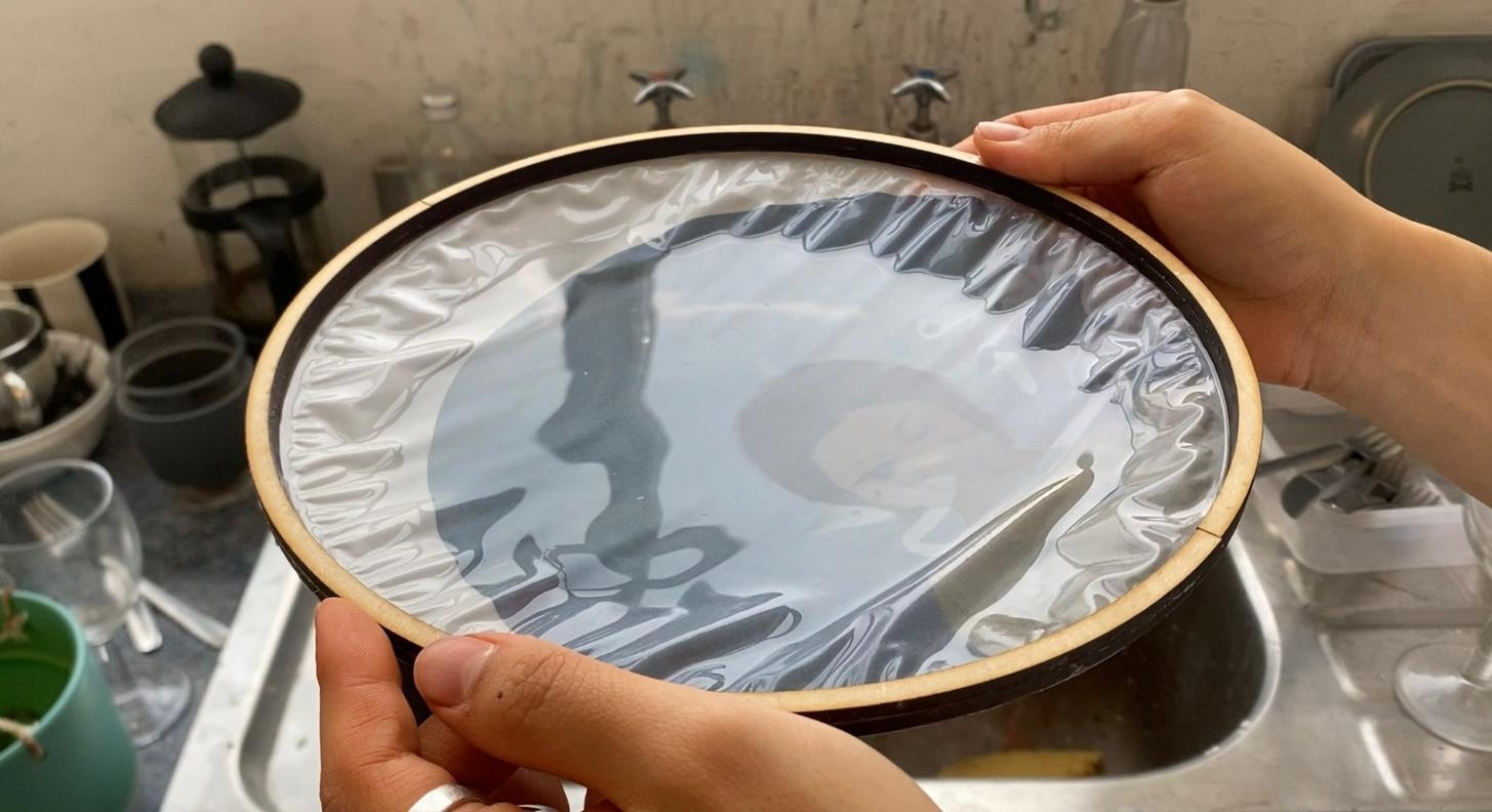 Experimenting with tracing paper print and water 