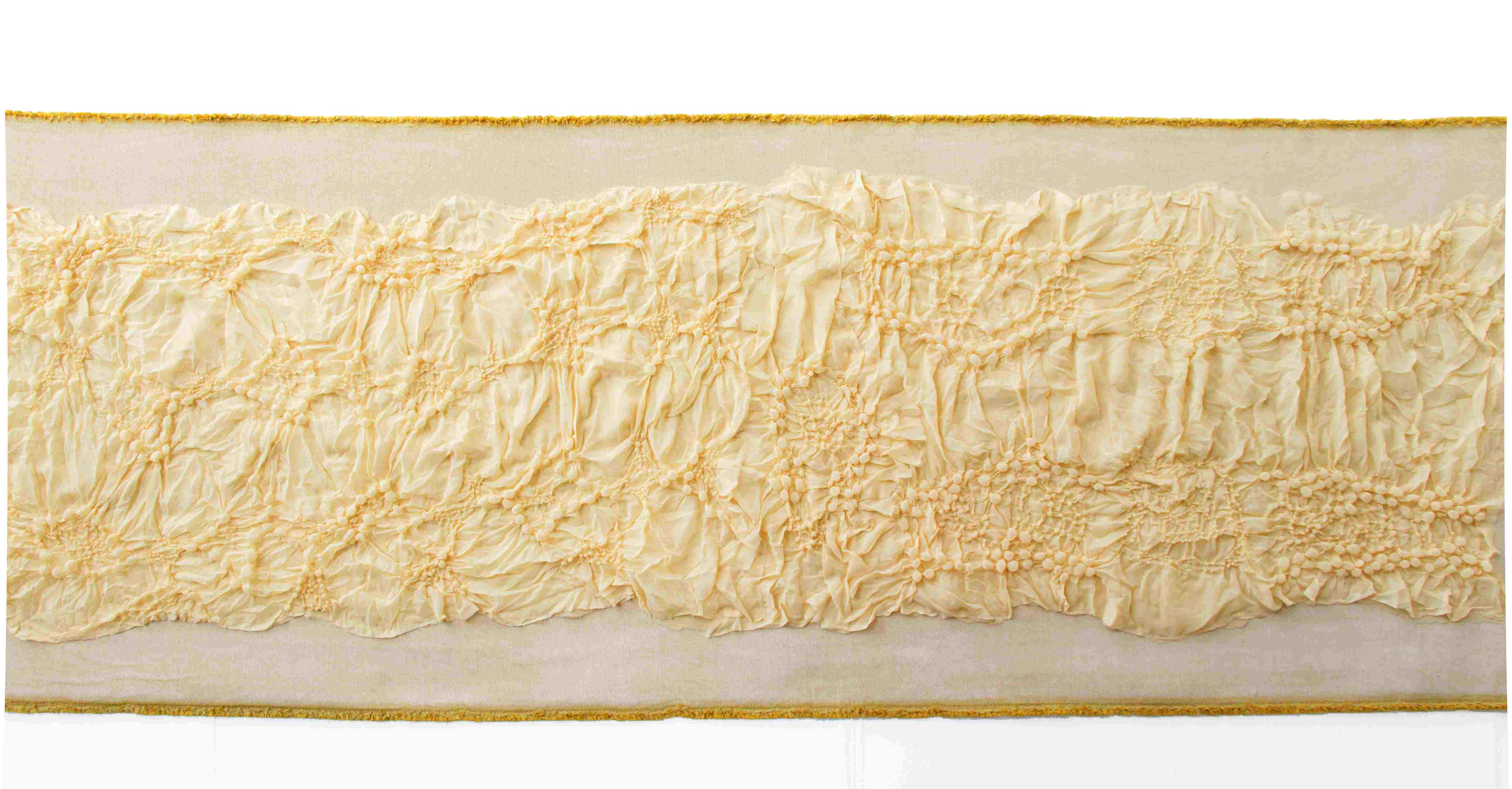 Yellow frieze pattern polyester mounted onto yellow carpet texture, flowing from left to right 