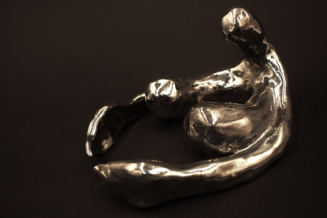 Platinum lustre clitoris terracotta sculpture.